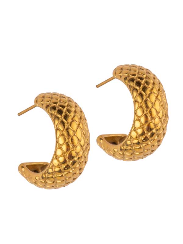 Guldhoops med mönstrad yta.